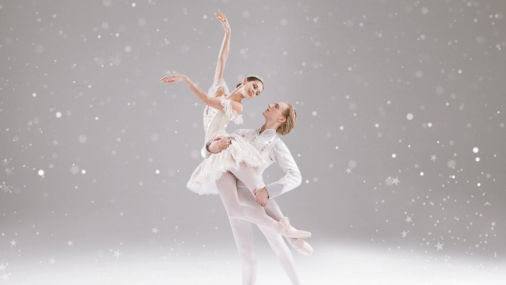 David Hallberg and Polina Semionova ballet dancing The Nutcracker to the background of snow  