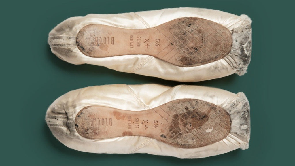 A pair of used pointe shoes 