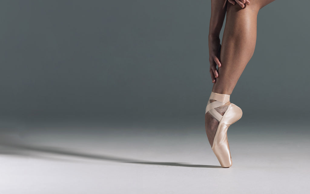 BLOCH Etu Suede Toe Pointe Shoe en Pointe on Models Foot on Grey Background